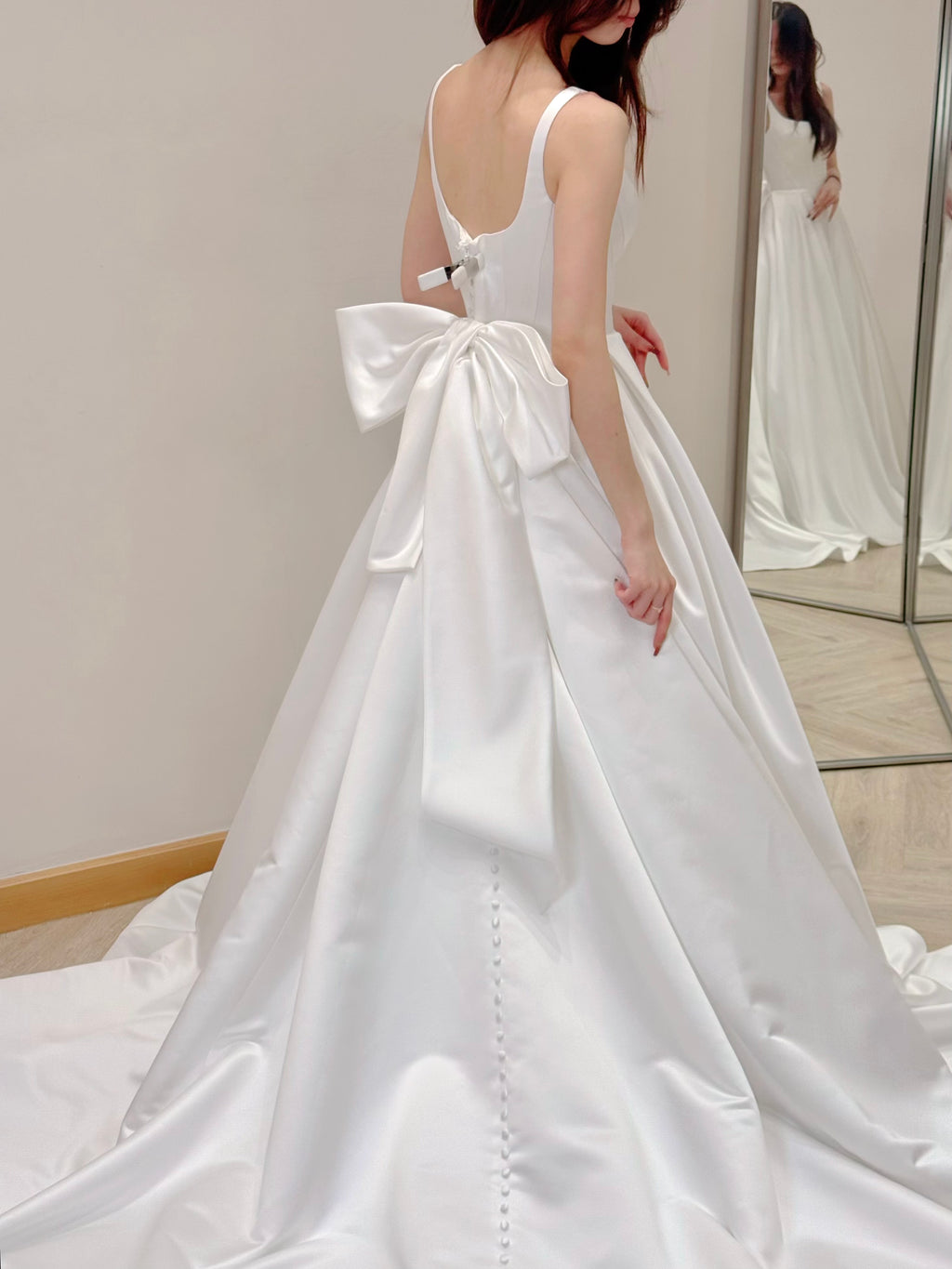 Luxurious Satin Bridal Gown with Removable Back Bow and Train