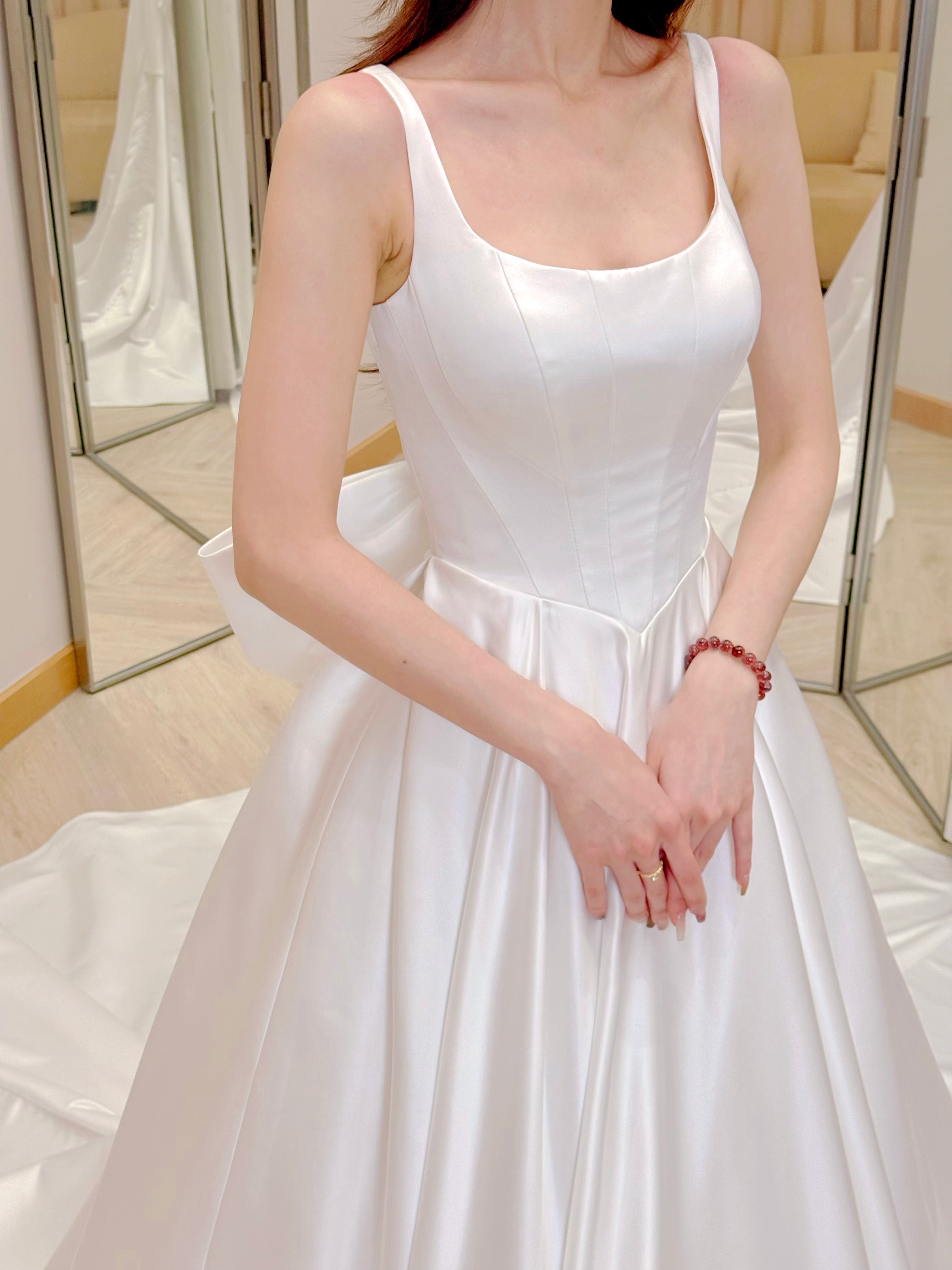 Luxurious Satin Bridal Gown with Removable Back Bow and Train