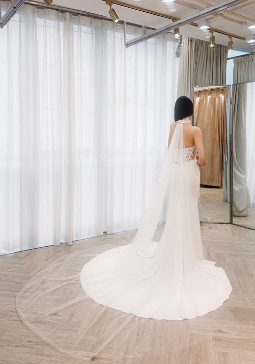 Elegant Fitted Bridal Gown with Removable Neck Piece and Sweep Train
